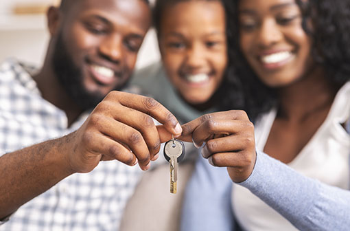 A family holding a key